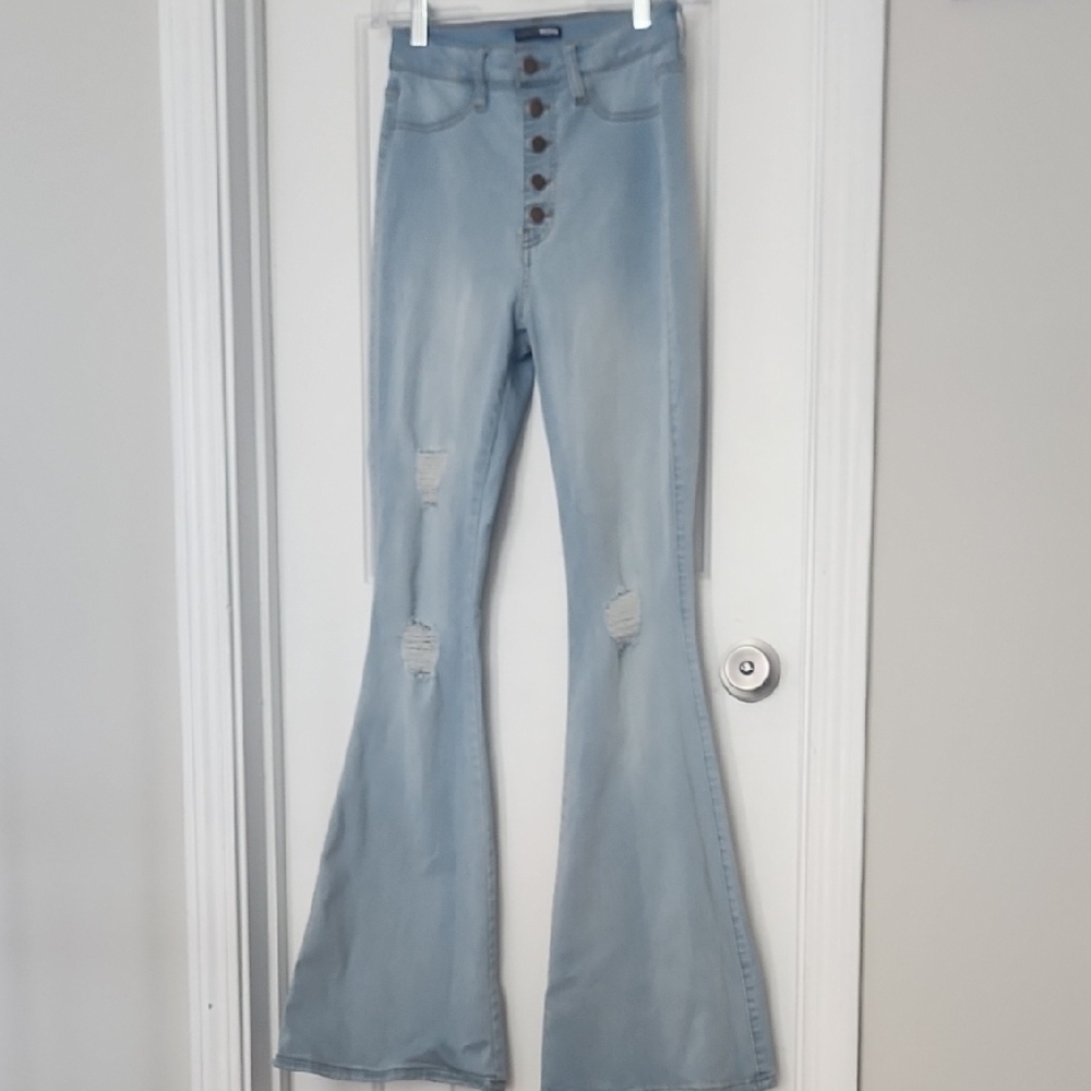 Light Blue Flared Jeans with Distressed Details